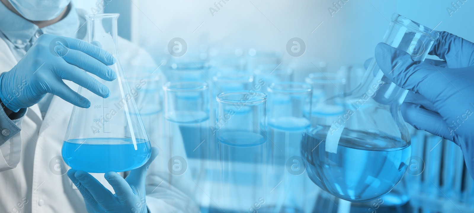 Image of Laboratory analysis. Scientists holding flasks, double exposure with test tubes