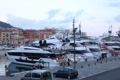 Photo of Nice, France - August 24, 2025: Picturesque view of moored boats in harbor near city