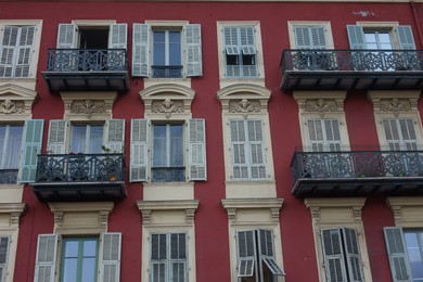 Photo of Nice, France - August 24, 2025: Beautiful building with windows in city, low angle view