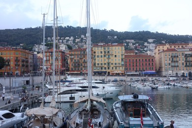 Photo of Nice, France - August 24, 2025: Picturesque view of moored boats in harbor near city