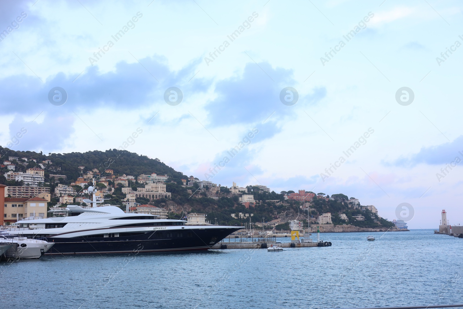 Nice, France - August 24, 2025: Picturesque view of moored boats in harbor near city Photo of Nice, France - August 24, 2025: Picturesque view of moored boats in harbor near city