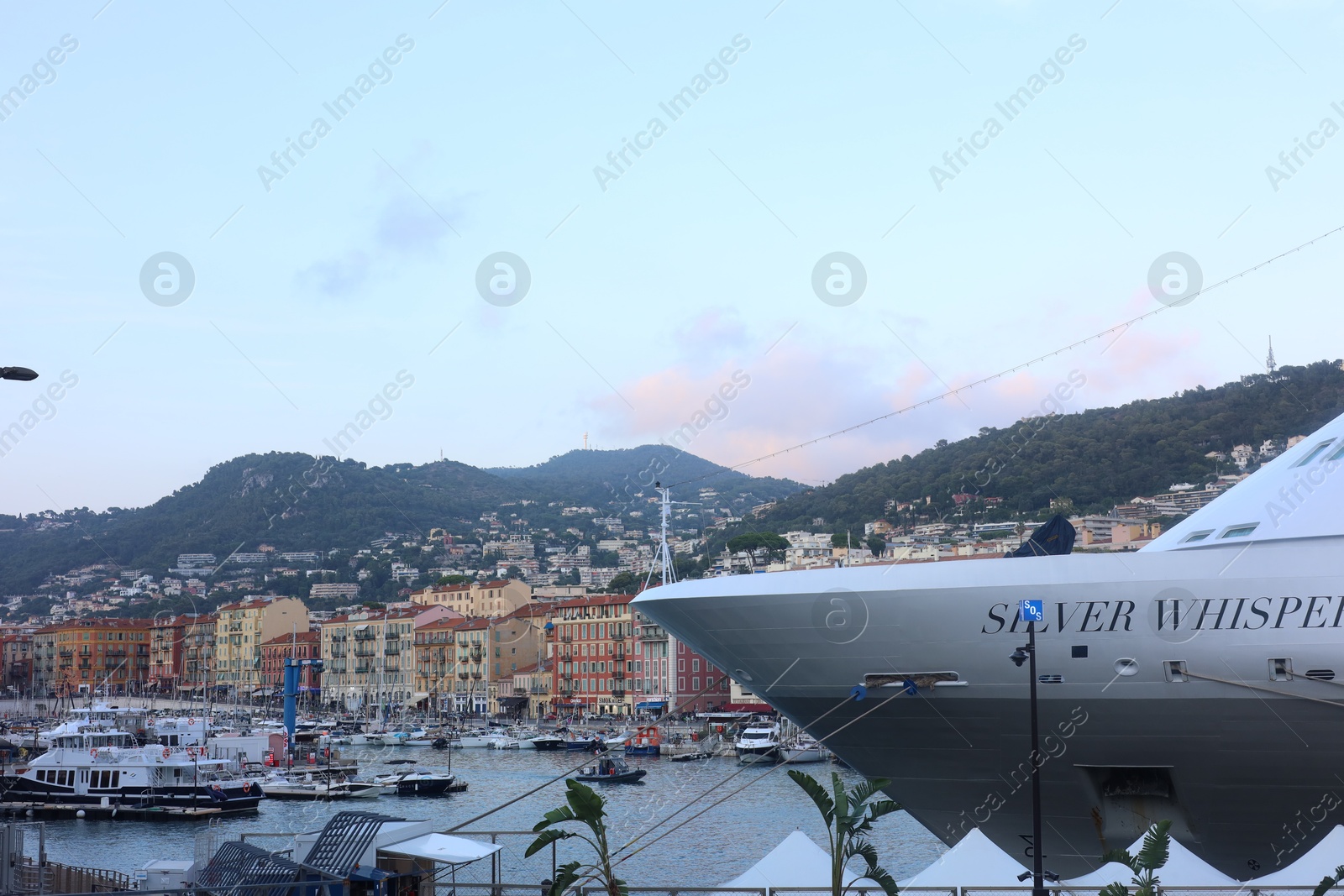 Photo of Nice, France - August 24, 2025: Picturesque view of moored boats and cruise ship in harbor near city