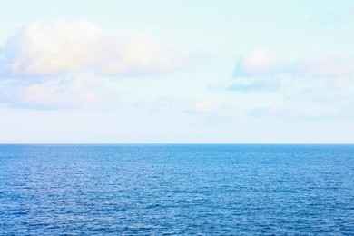 Photo of Beautiful view of wavy sea under blue cloudy sky