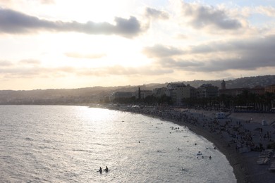Photo of Nice, France - August 24, 2025: Picturesque view of sea and people on beach near city