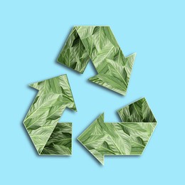 Image of Recycle sign. Chasing arrows with pattern of green leaves on light blue background