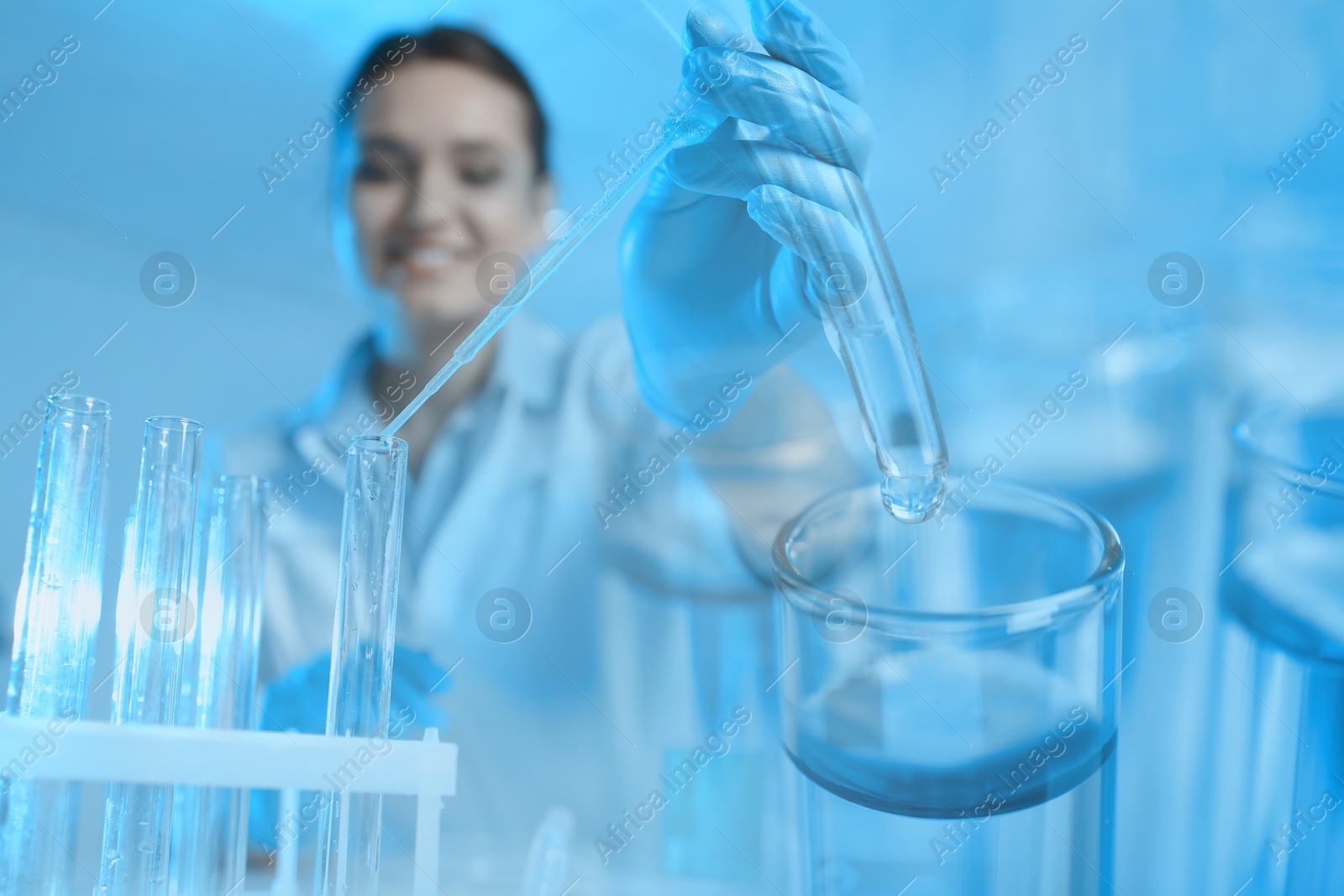 Image of Laboratory analysis. Scientist working with sample, double exposure with test tubes