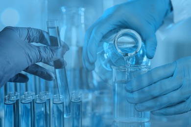 Image of Laboratory analysis. Scientists working with glassware, multiple exposure