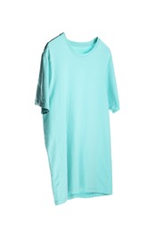 Photo of Light blue t-shirt isolated on white. Mockup for design