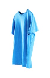 Photo of Light blue t-shirt isolated on white. Mockup for design