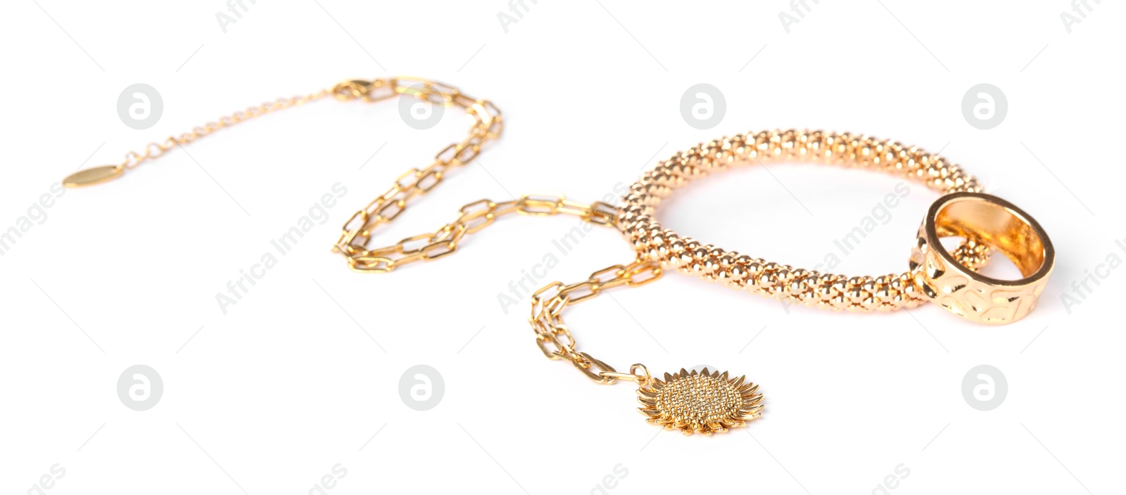 Photo of Many different gold jewelry isolated on white