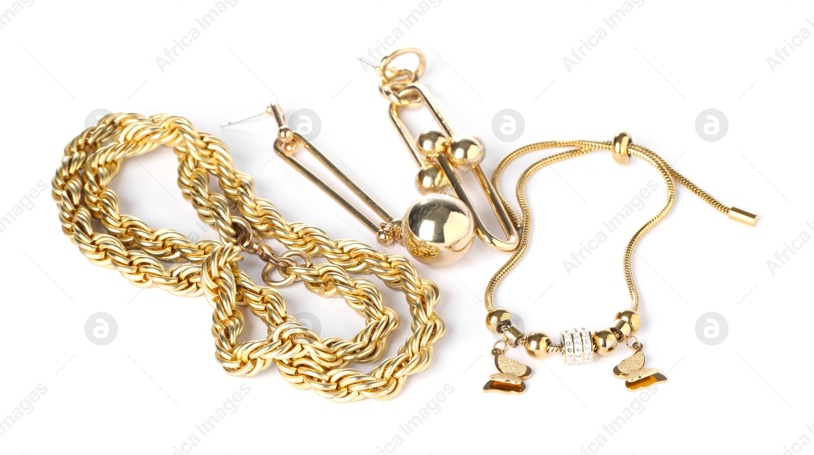 Photo of Many different gold jewelry isolated on white