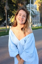 Photo of Portrait of beautiful woman on city street
