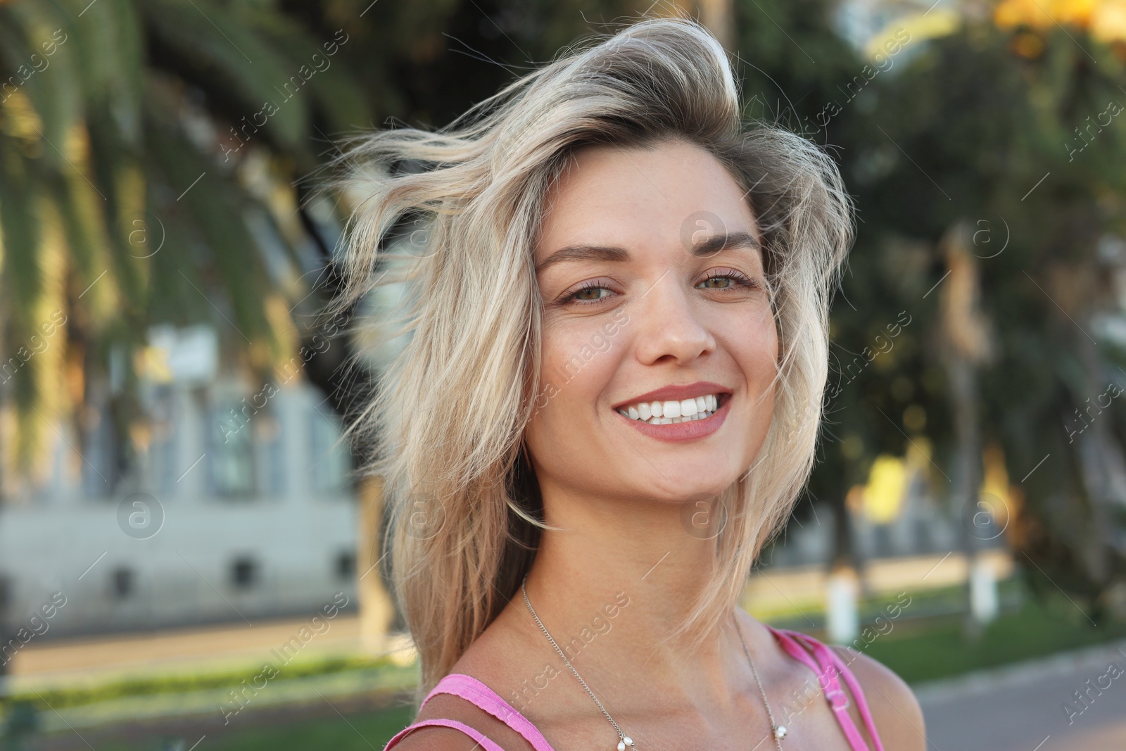 Photo of Portrait of beautiful woman on city street