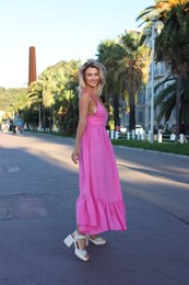 Photo of Portrait of beautiful woman on city street
