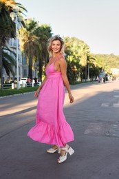Photo of Portrait of beautiful woman on city street
