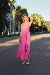 Photo of Portrait of beautiful woman on city street