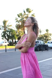 Photo of Portrait of beautiful woman on city street