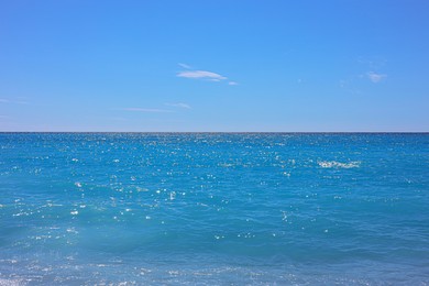 Photo of Beautiful view of wavy sea under blue sky