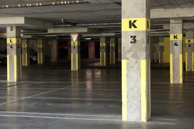 Photo of Underground parking with dedicated spots and cars