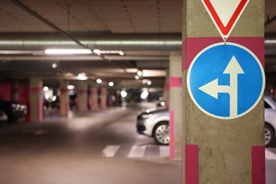 Photo of Traffic signs on column in underground parking