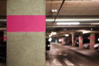 Photo of Underground parking with dedicated spots and cars