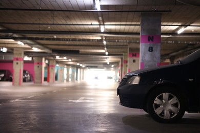 Photo of View of underground garage with parked car