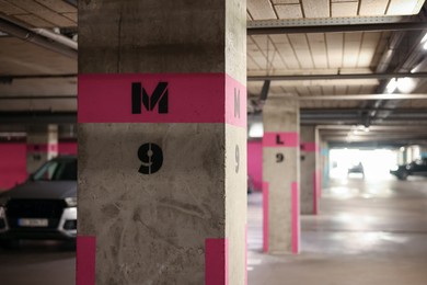Photo of Underground parking with dedicated spots and cars