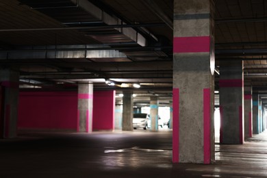 Photo of Underground parking with dedicated spots and cars