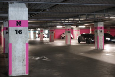 Photo of View of underground garage with parked cars