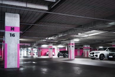 Photo of View of underground garage with parked cars