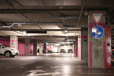 Photo of View of underground garage with parked cars