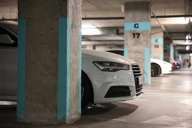 Photo of View of underground garage with parked cars