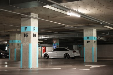 Photo of View of underground garage with parked cars