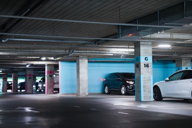 Photo of View of underground garage with parked cars