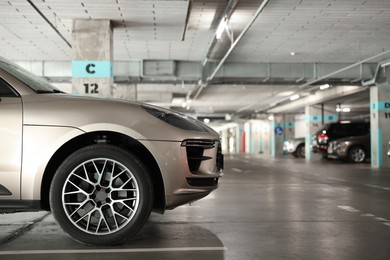 Photo of View of underground garage with parked cars