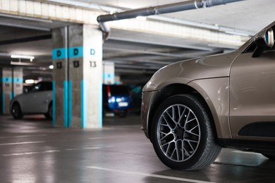 Photo of View of underground garage with parked cars