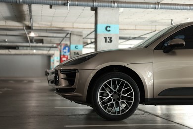 Photo of View of underground garage with parked cars