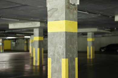 Photo of Underground parking with dedicated spots and cars