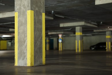 Photo of Underground parking with dedicated spots and cars