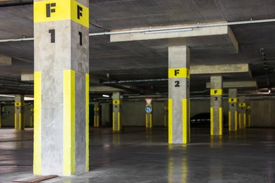Photo of Underground parking with dedicated spots and cars