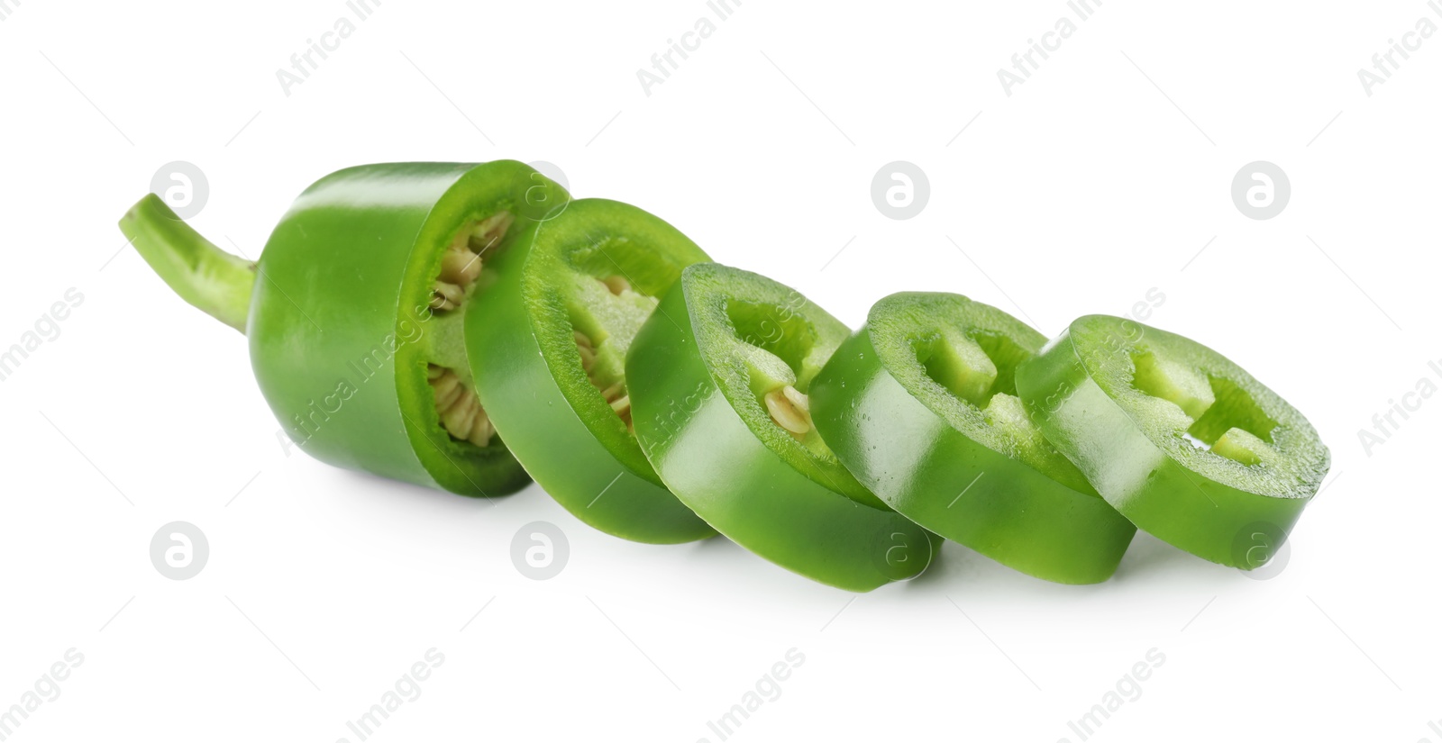 Photo of Slices of green jalapeno pepper isolated on white