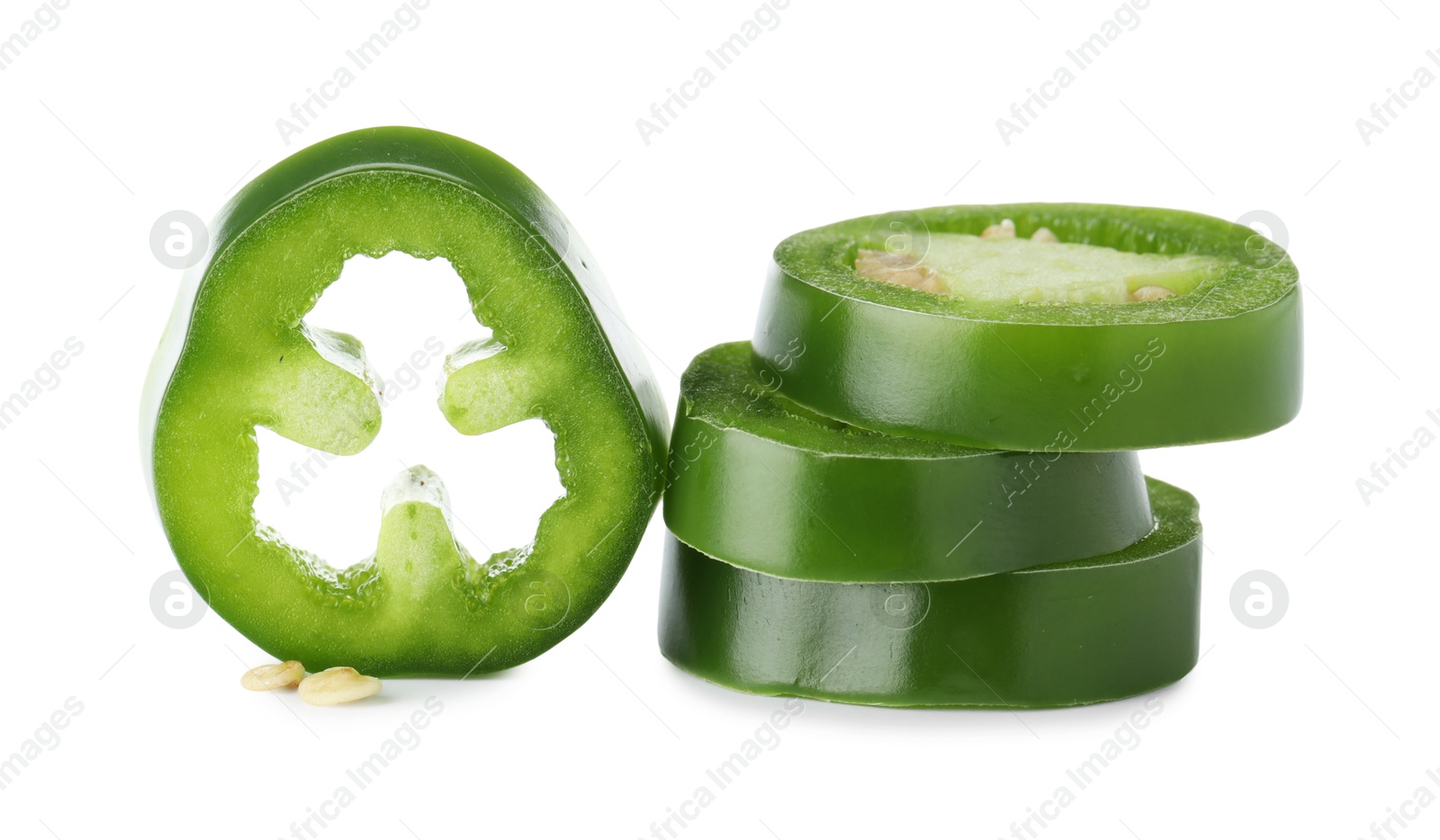 Photo of Slices of green jalapeno pepper isolated on white