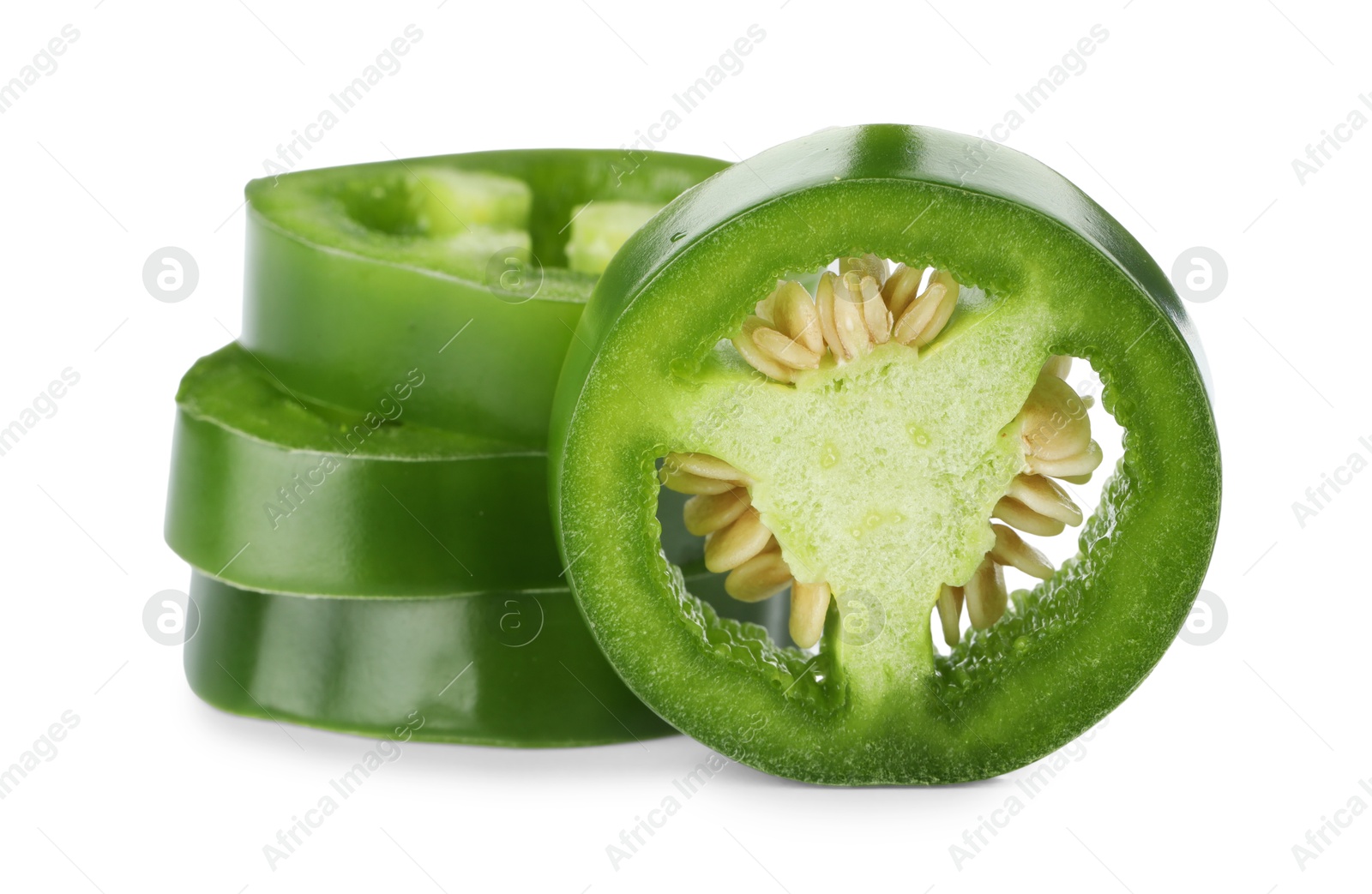 Photo of Slices of green jalapeno pepper isolated on white
