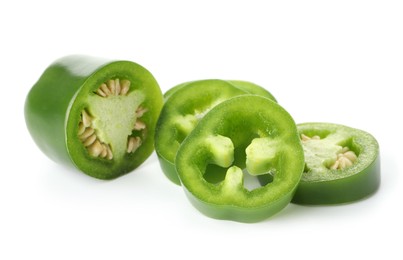 Photo of Slices of green jalapeno pepper isolated on white