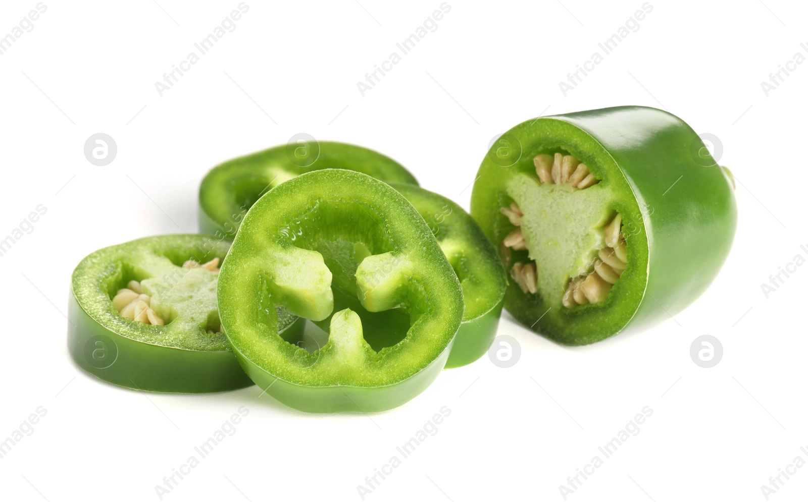 Photo of Slices of green jalapeno pepper isolated on white