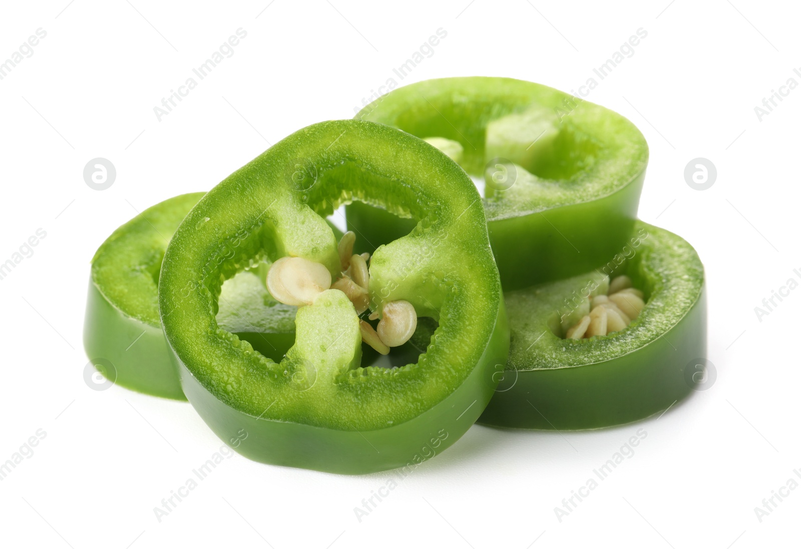Photo of Slices of green jalapeno pepper isolated on white