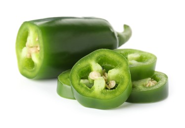 Photo of Slices of green jalapeno pepper isolated on white