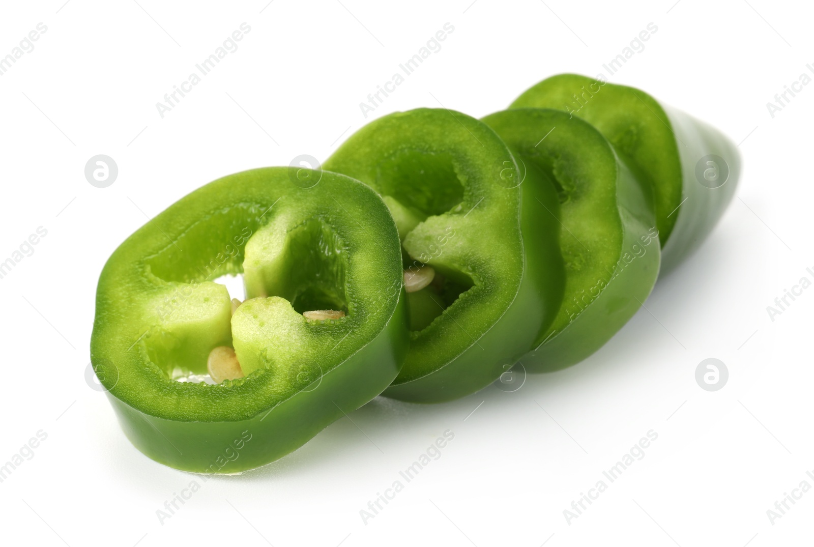 Photo of Slices of green jalapeno pepper isolated on white