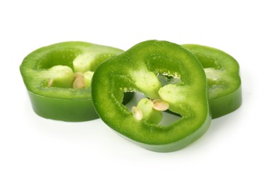 Photo of Slices of green jalapeno pepper isolated on white
