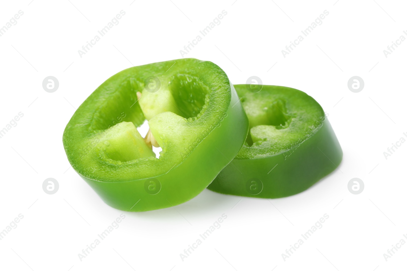 Photo of Slices of green jalapeno pepper isolated on white